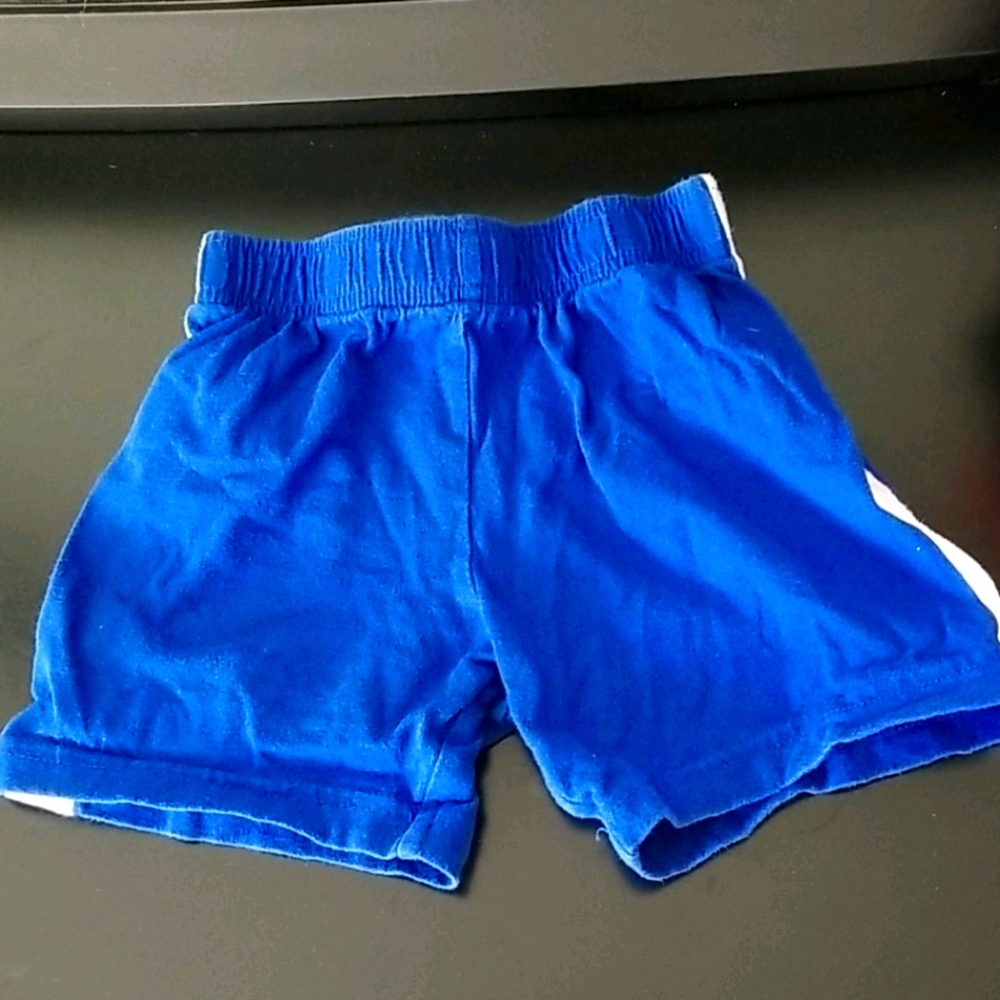 5/25 Blue shorts w/ white stripe down side size 2T